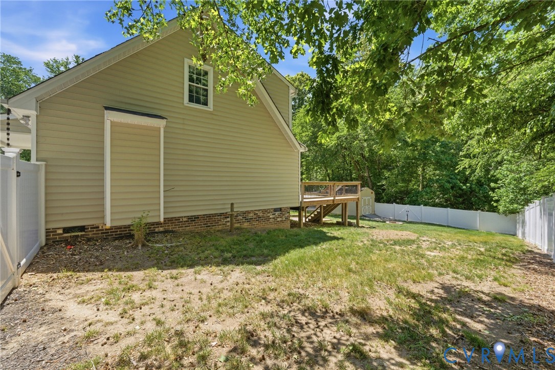 2512 Brookforest Road Midlothian, VA 23112 - Photo 37 of 40 Expansive backyard featuring a wood deck, white pr