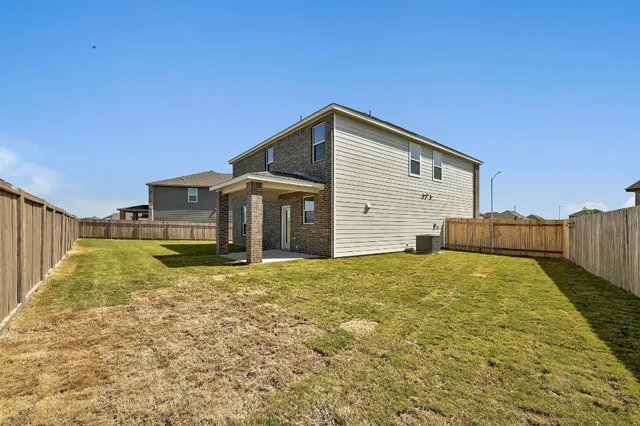 a house view with a outdoor space