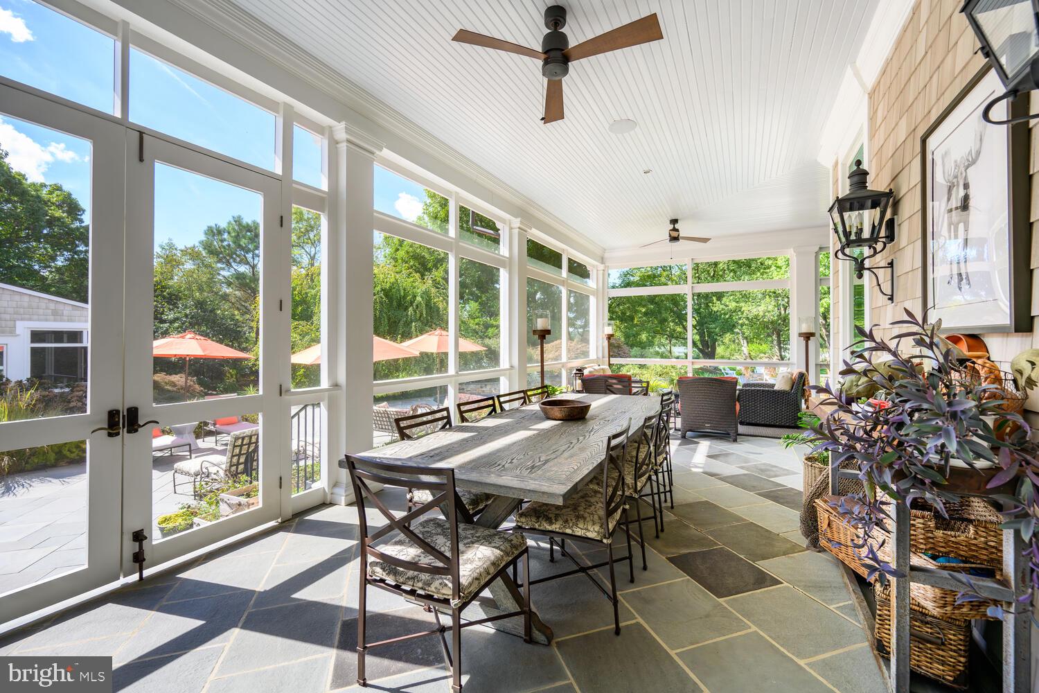 7508 Cooper Point Road Bozman, MD 21612 - Photo 53 of 116 Screen Porch overlooking gunite pool w/ waterfall
