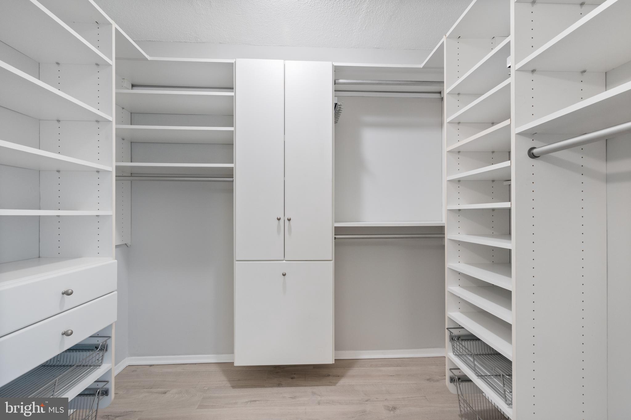 4515 Willard Avenue, Unit 1203S Chevy Chase, MD 20815 - Photo 19 of 40 Amazing walk in closet in primary bedroom