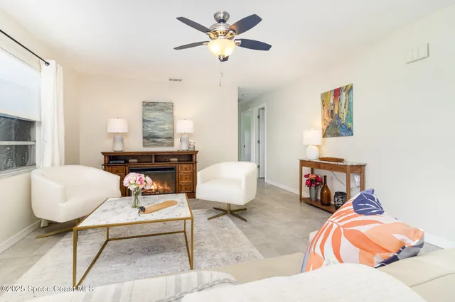 a kitchen with stainless steel appliances granite countertop a refrigerator sink and stove