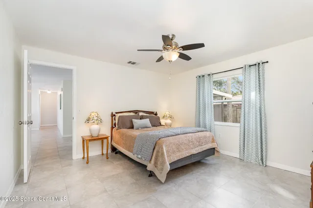 an empty room with closet area