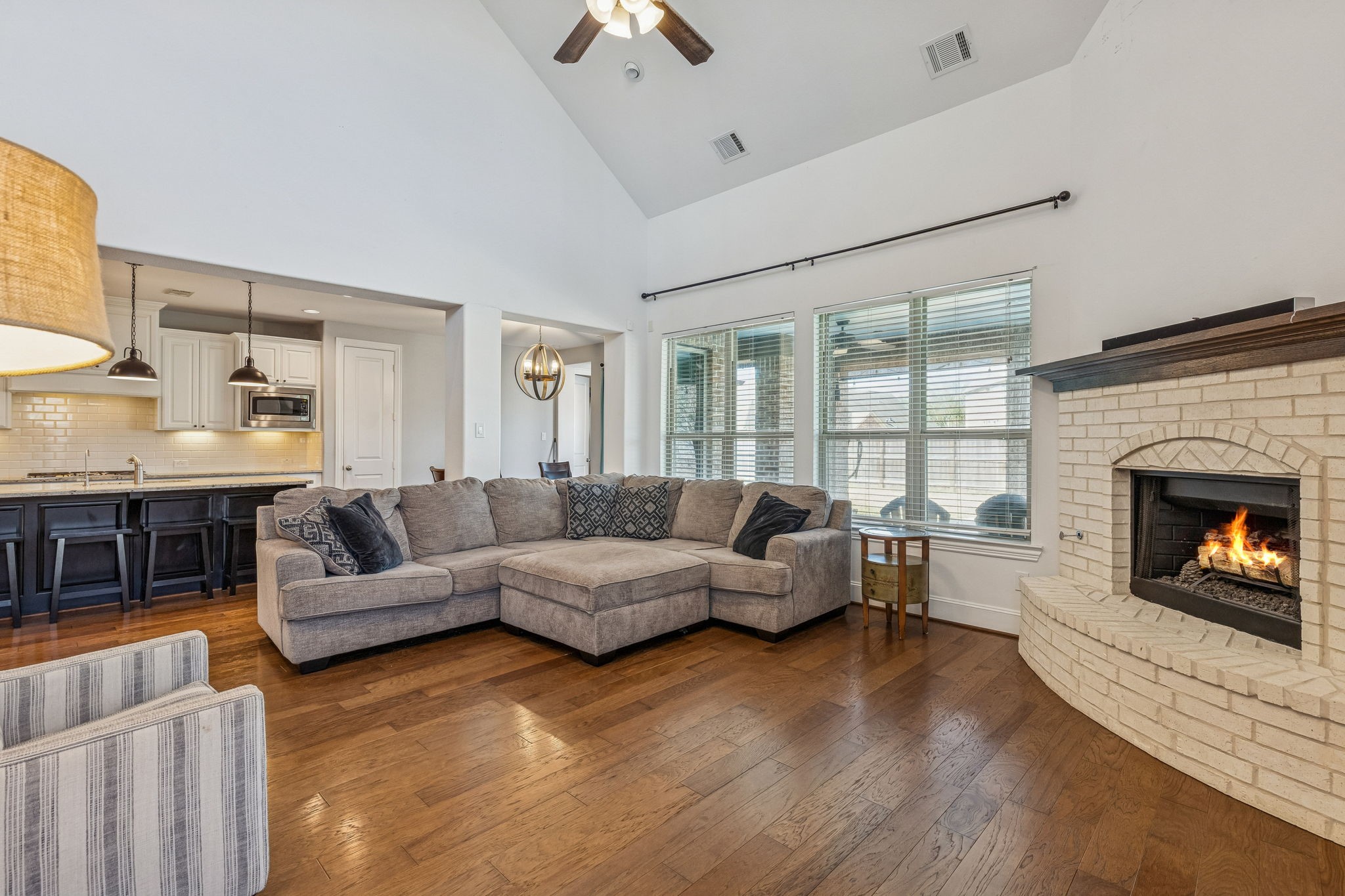 29918 Valley Terrace Drive Fulshear, TX 77406 - Photo 6 of 27 Experience true open-concept living in this airy living room that flows effortlessly into the kitchen and breakfast area.