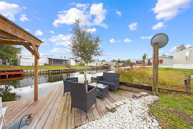 a view of a patio with swimming pool