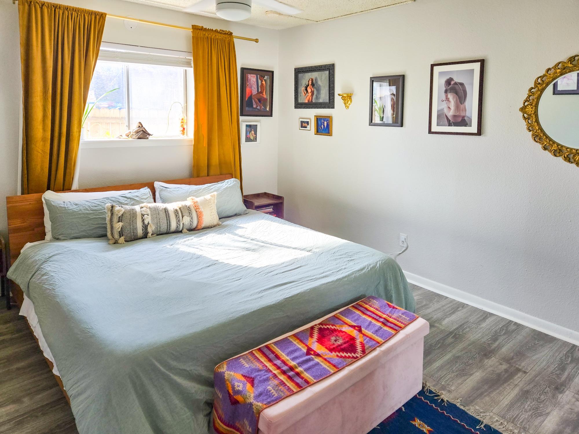 1725 Toomey Road, Unit 102 Austin, TX 78704 - Photo 12 of 13 Bedroom featuring dark wood-style floors and baseboards