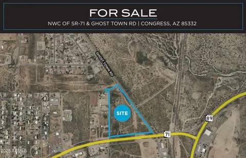 a view of a street with an outdoor space