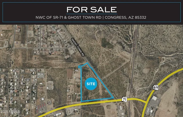 a view of a street with an outdoor space