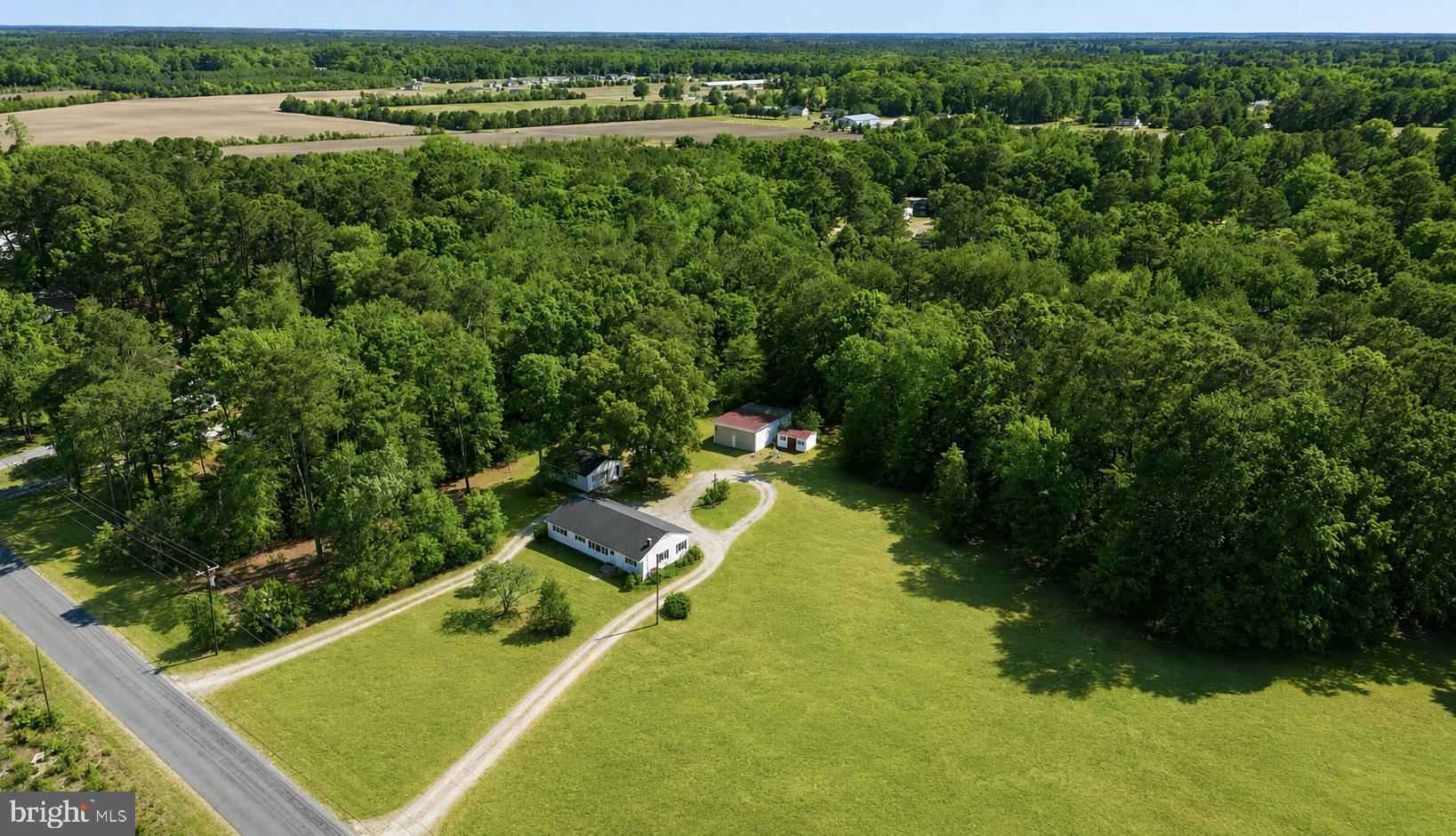 5150 Campground Road Eden, MD 21822 - Photo 2 of 43 a view of a lake with a yard