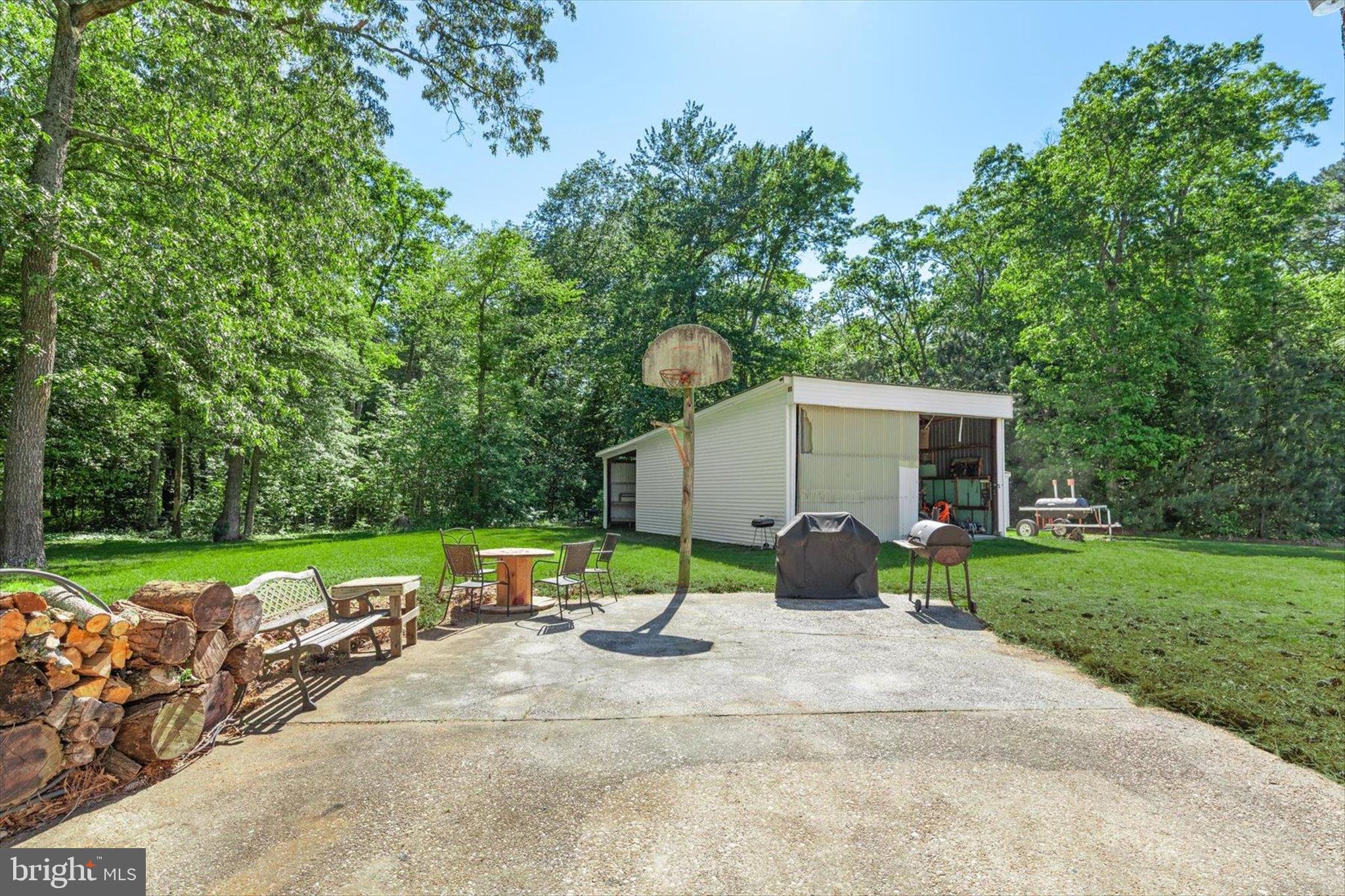 5150 Campground Road Eden, MD 21822 - Photo 36 of 43 a view of a house with backyard and a garden