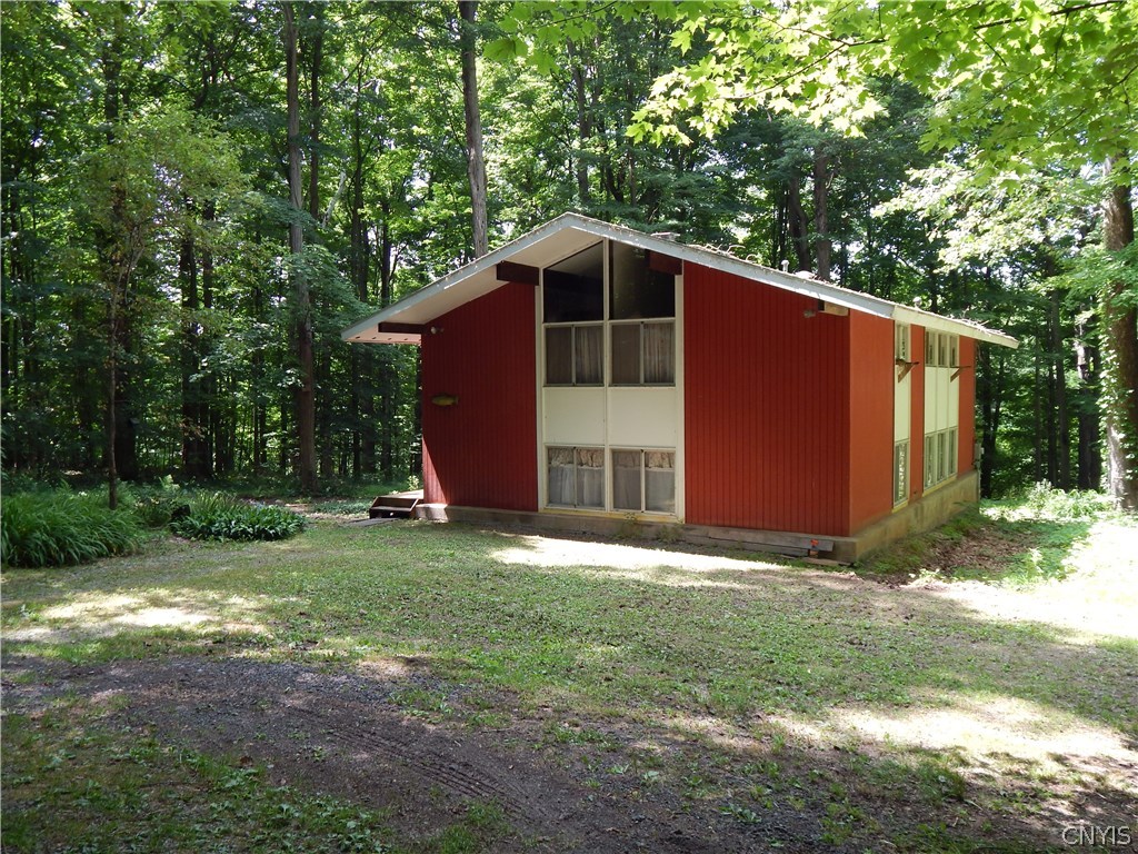 7242 Farnham Road Lysander, NY 13112 - Photo 1 of 1 You'll Love The Private Wooded Setting At This Coz
