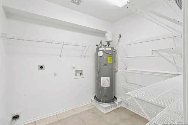 a view of a storage & utility room with racks on the wall