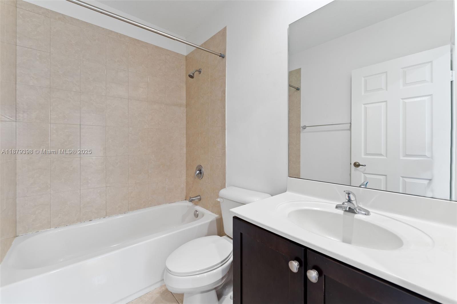 9035 Southwest 17th Court Miramar, FL 33025 - Photo 30 of 39 a bathroom with a sink toilet a mirror and shower