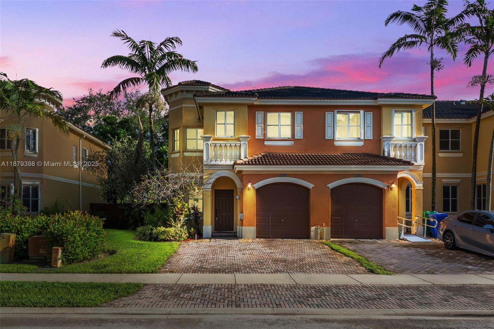 9035 Southwest 17th Court Miramar, FL 33025 - Photo 32 of 39 a front view of a house with a garden and a tree