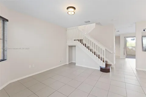 a view of entryway and hall with a window