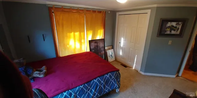 a view of a street with sitting area