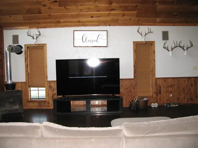 a living room with a couch and a fireplace
