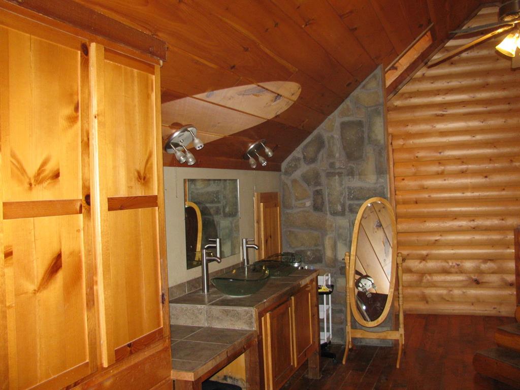 941 North 4420th Road Valliant, OK 74764 - Photo 24 of 40 a front view of a house with chairs