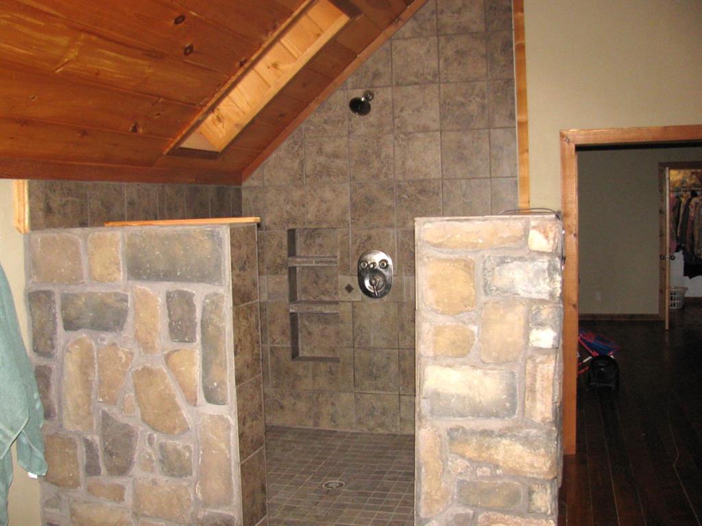 941 North 4420th Road Valliant, OK 74764 - Photo 27 of 40 a bathroom with a shower