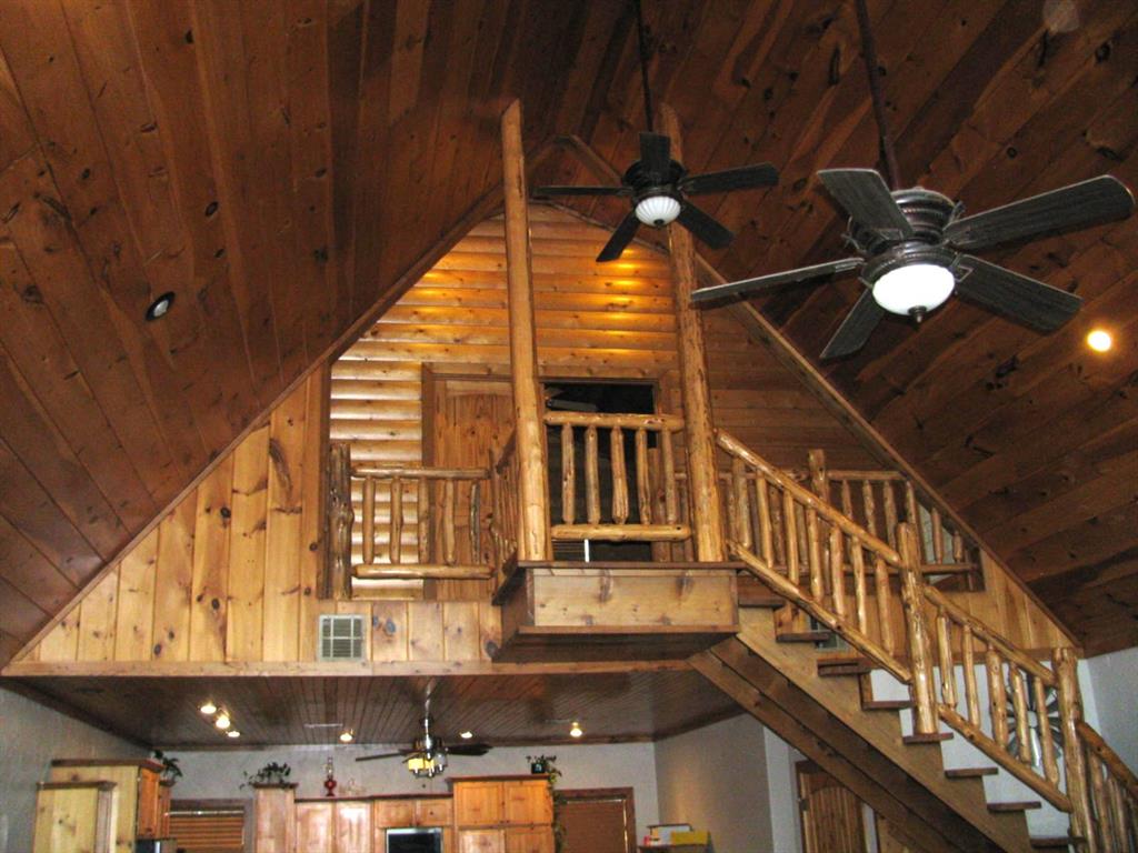 941 North 4420th Road Valliant, OK 74764 - Photo 8 of 40 a view of a balcony with staircase