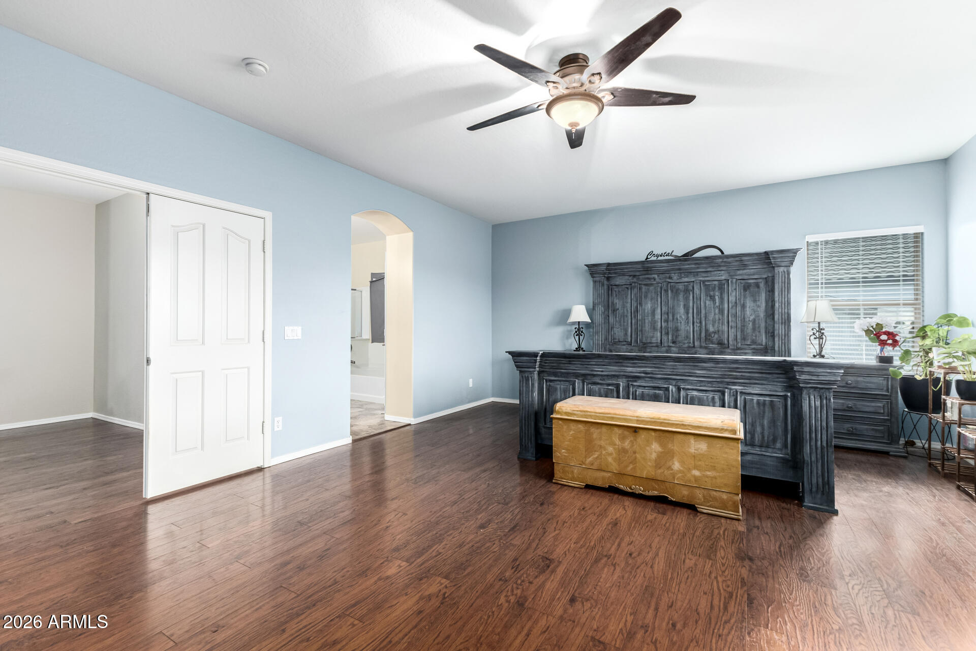 24541 Plum Road Florence, AZ 85132 - Photo 19 of 47 a room with furniture and wooden floor