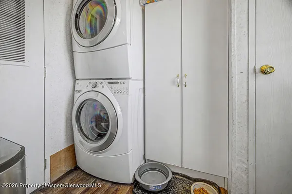 a view of a house with a snow in the yard