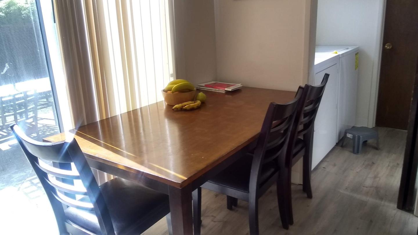 698 Danforth Drive Sunnyvale, CA 94087 - Photo 16 of 23 a view of a dining room with furniture and a window