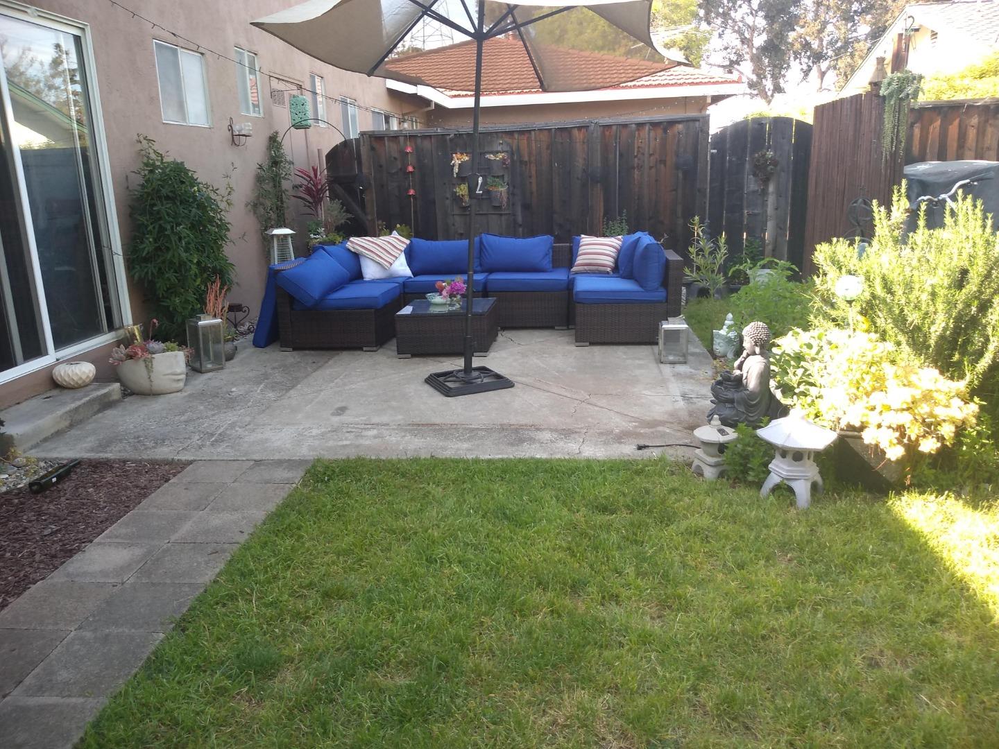 698 Danforth Drive Sunnyvale, CA 94087 - Photo 19 of 23 a view of backyard with outdoor seating and green space