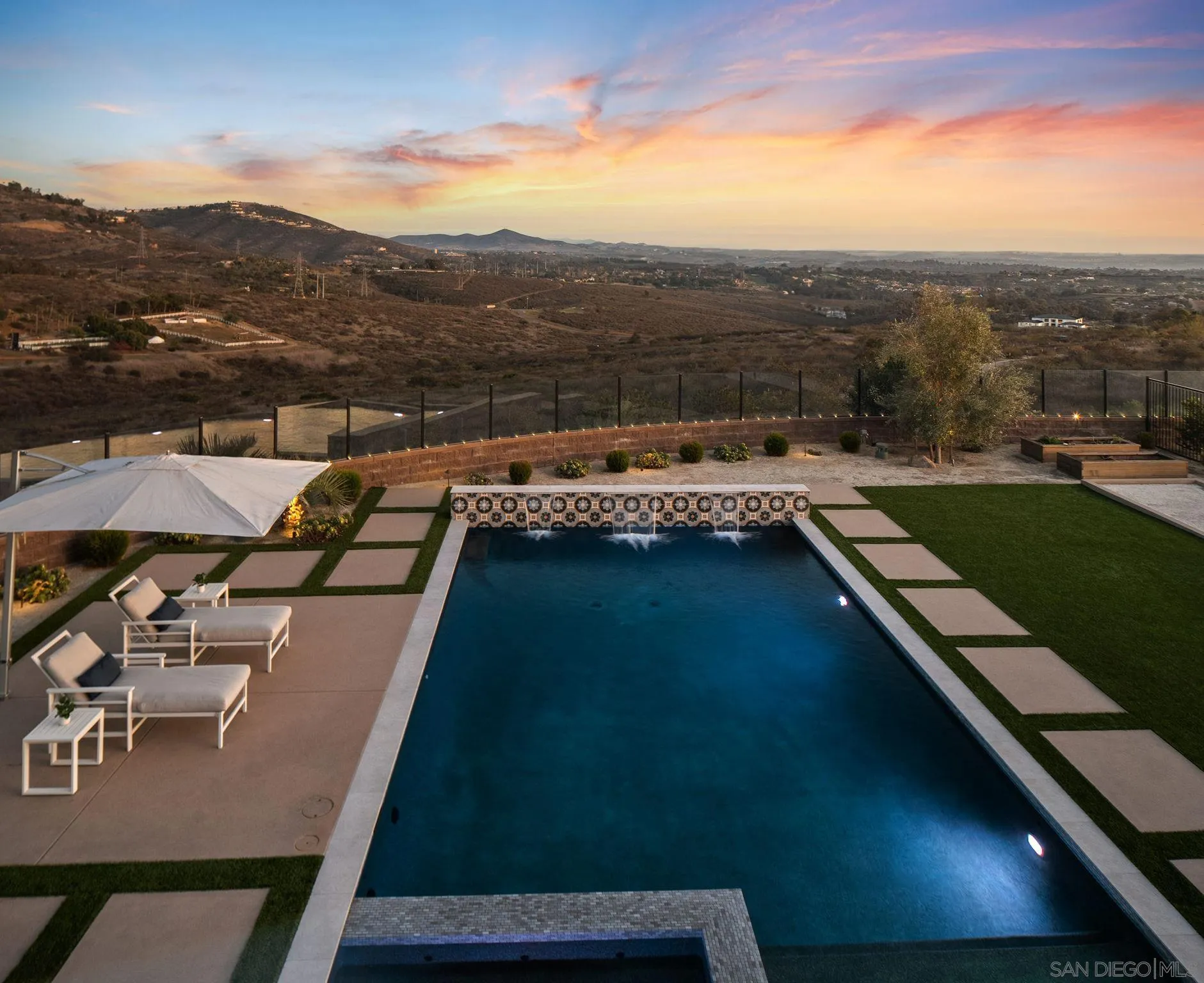3801 Rancho Summit Drive Encinitas, CA 92024 - Photo 9 of 10 a view of a terrace with a yard