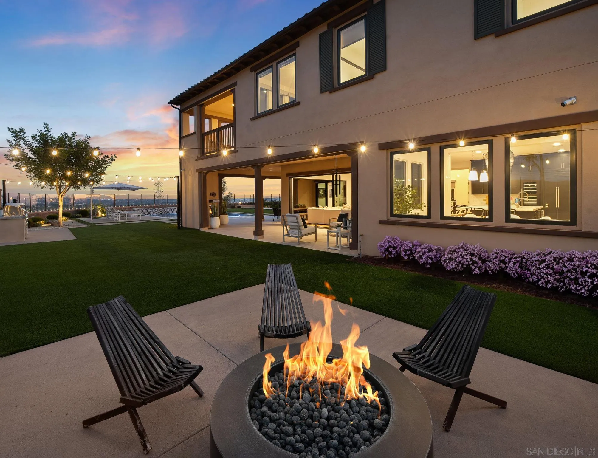 3801 Rancho Summit Drive Encinitas, CA 92024 - Photo 10 of 10 a view of a chair and table in the patio with a yard