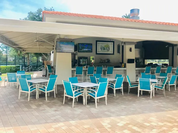 a view of yard with seating area and furniture