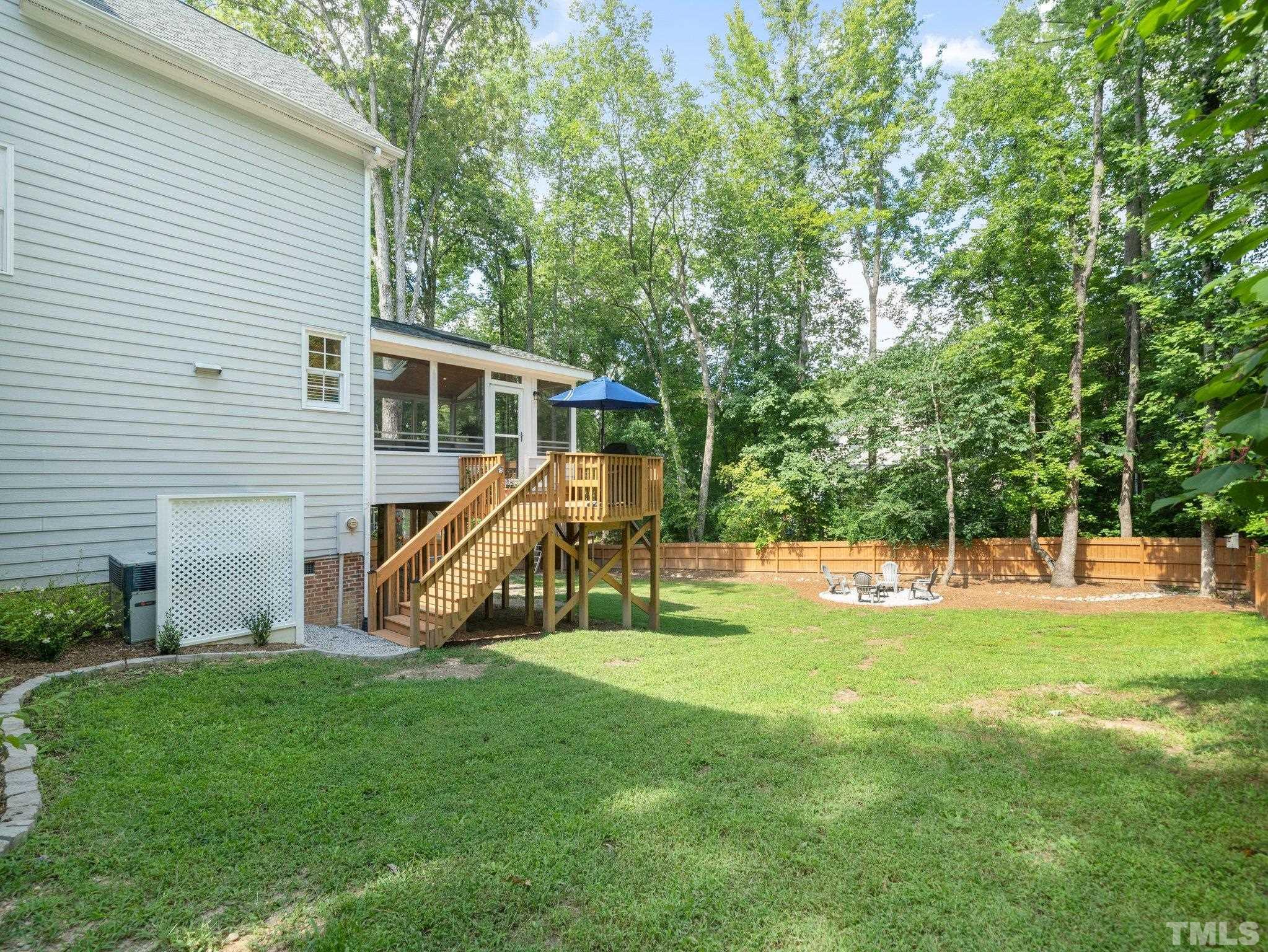 1304 Patterson Grove Road Apex, NC 27502 - Photo 29 of 34 This tree-lined back yard has something for everyone!