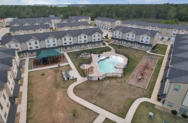 an aerial view of a house with outdoor space patio and mountain view