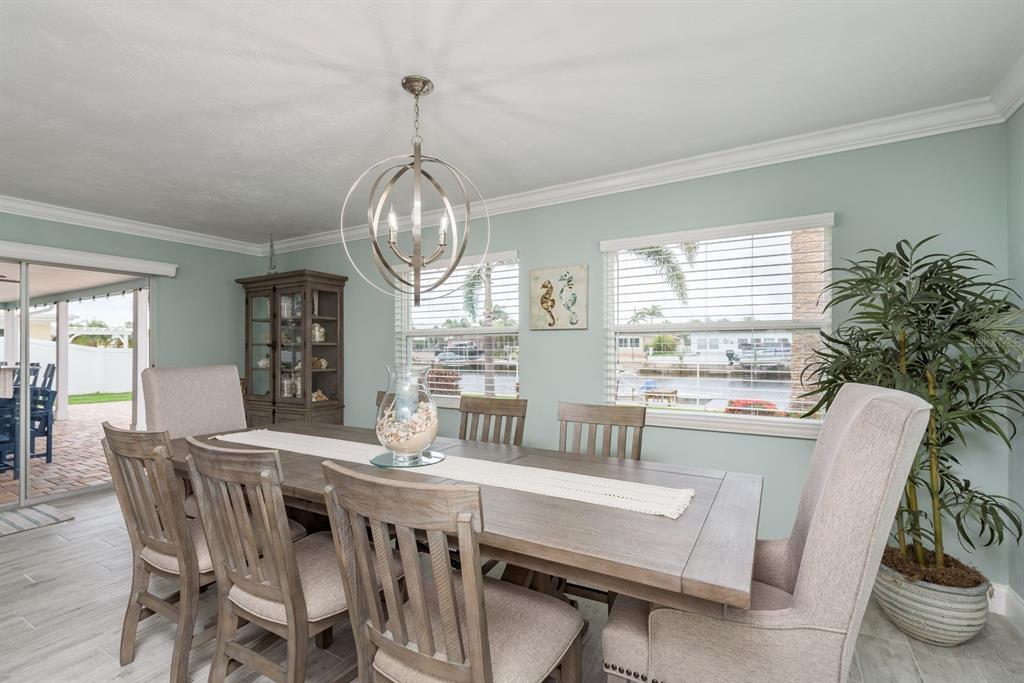 3301 Seaway Drive New Port Richey, FL 34652 - Photo 17 of 53 a view of a dining room with furniture window and outside view