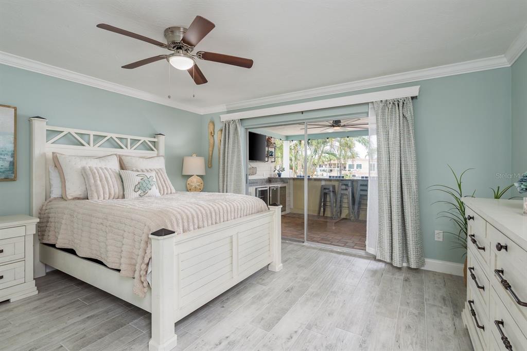 3301 Seaway Drive New Port Richey, FL 34652 - Photo 19 of 53 a bedroom with a large bed and a window