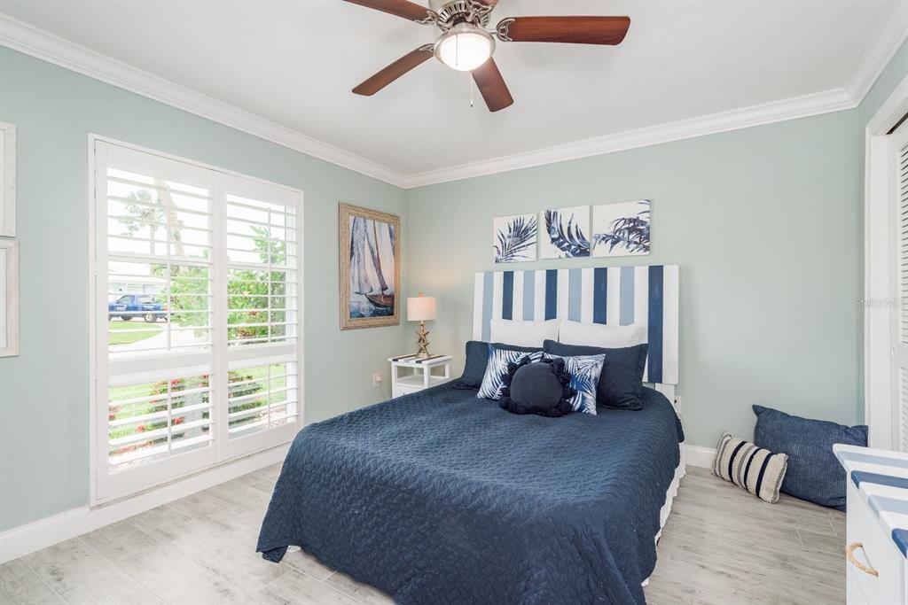 3301 Seaway Drive New Port Richey, FL 34652 - Photo 22 of 53 a bedroom with a bed and window