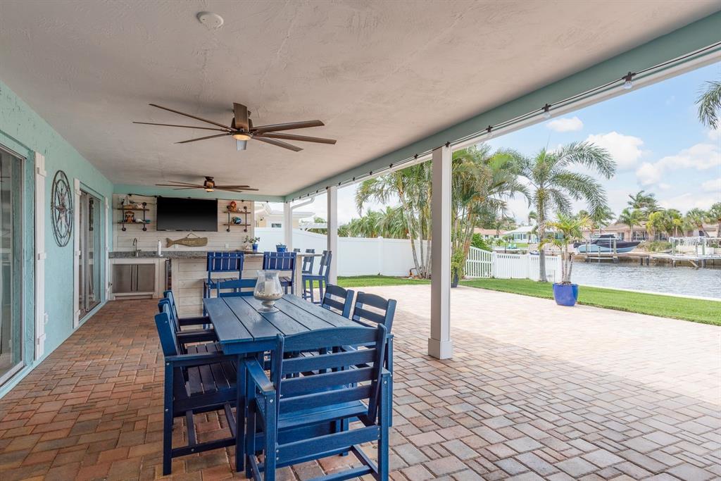 3301 Seaway Drive New Port Richey, FL 34652 - Photo 25 of 53 a view of a dining room with furniture window and outside view