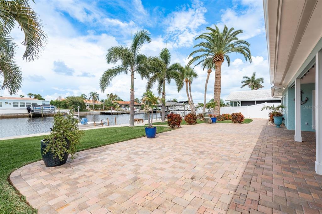 3301 Seaway Drive New Port Richey, FL 34652 - Photo 30 of 53 a view of a swimming pool and a chair