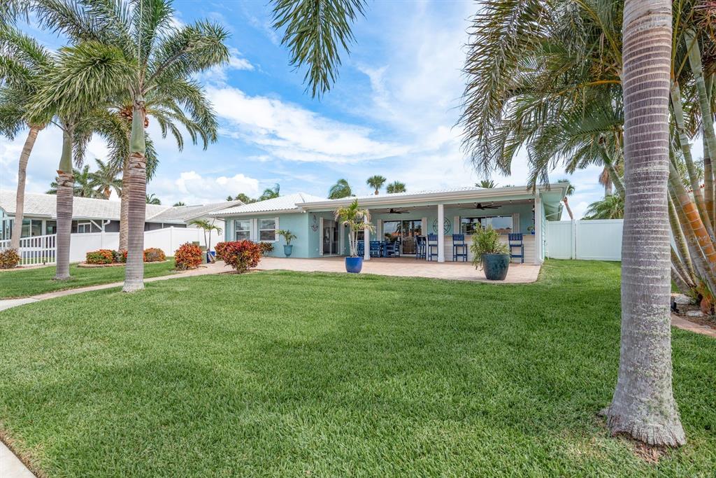 3301 Seaway Drive New Port Richey, FL 34652 - Photo 32 of 53 a view of a house with a yard from a patio