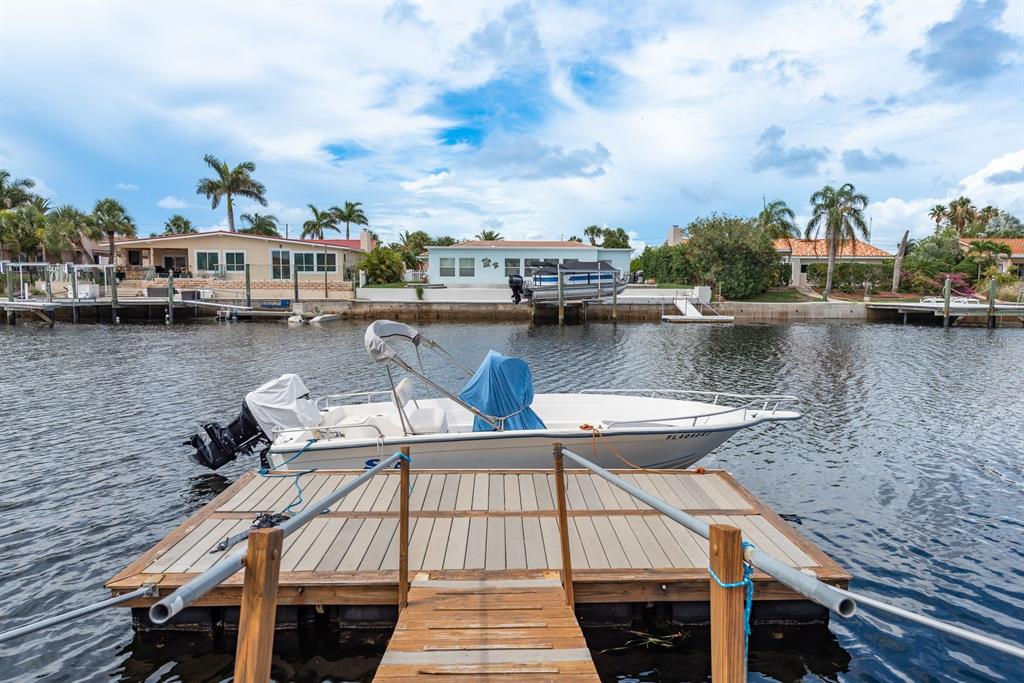 3301 Seaway Drive New Port Richey, FL 34652 - Photo 35 of 53 a view of a lake with sitting area