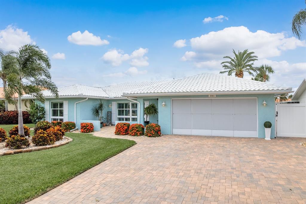 3301 Seaway Drive New Port Richey, FL 34652 - Photo 40 of 53 a view of a house with a backyard porch and sitting area