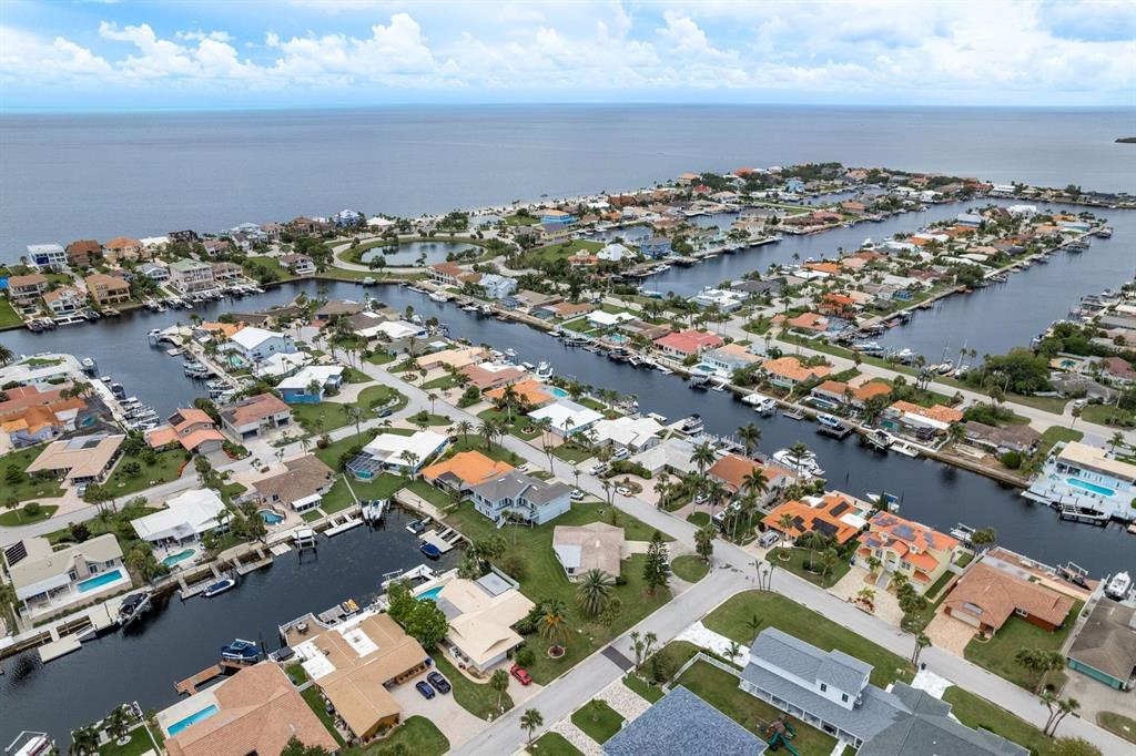3301 Seaway Drive New Port Richey, FL 34652 - Photo 45 of 53 an aerial view of a city with ocean view