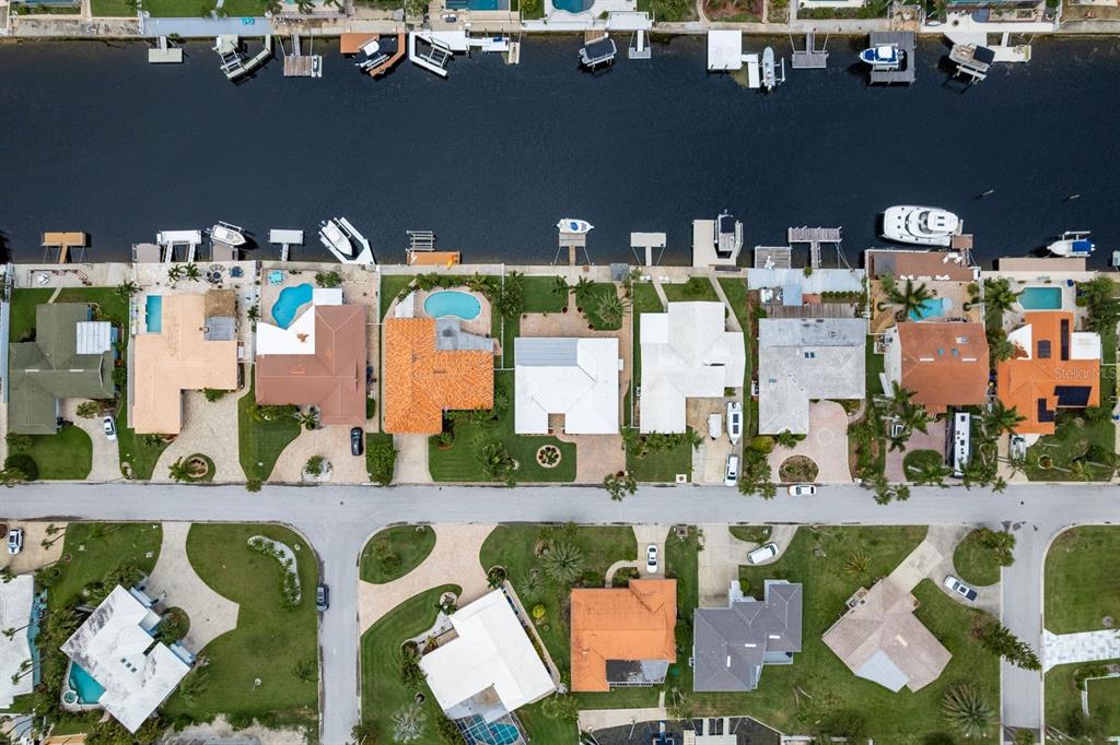 3301 Seaway Drive New Port Richey, FL 34652 - Photo 53 of 53 an aerial view of multiple houses with yard