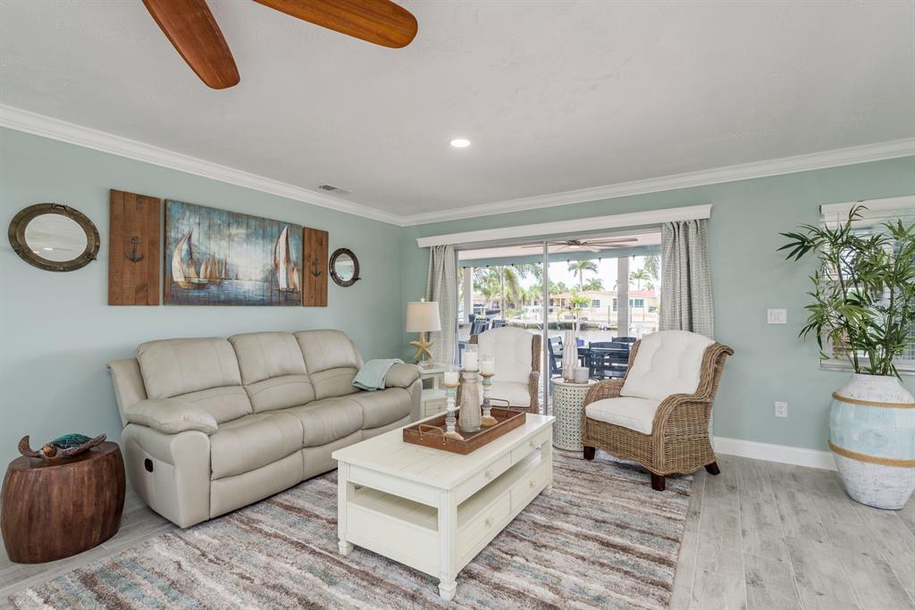 3301 Seaway Drive New Port Richey, FL 34652 - Photo 7 of 53 a living room with furniture and a large window