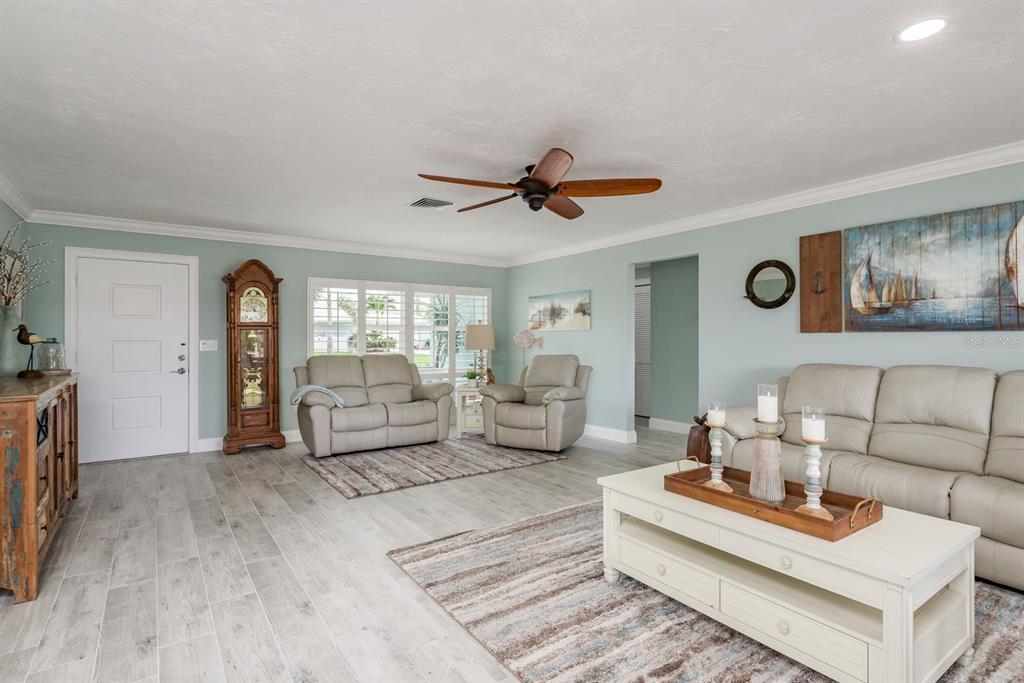 3301 Seaway Drive New Port Richey, FL 34652 - Photo 9 of 53 a living room with furniture and wooden floor