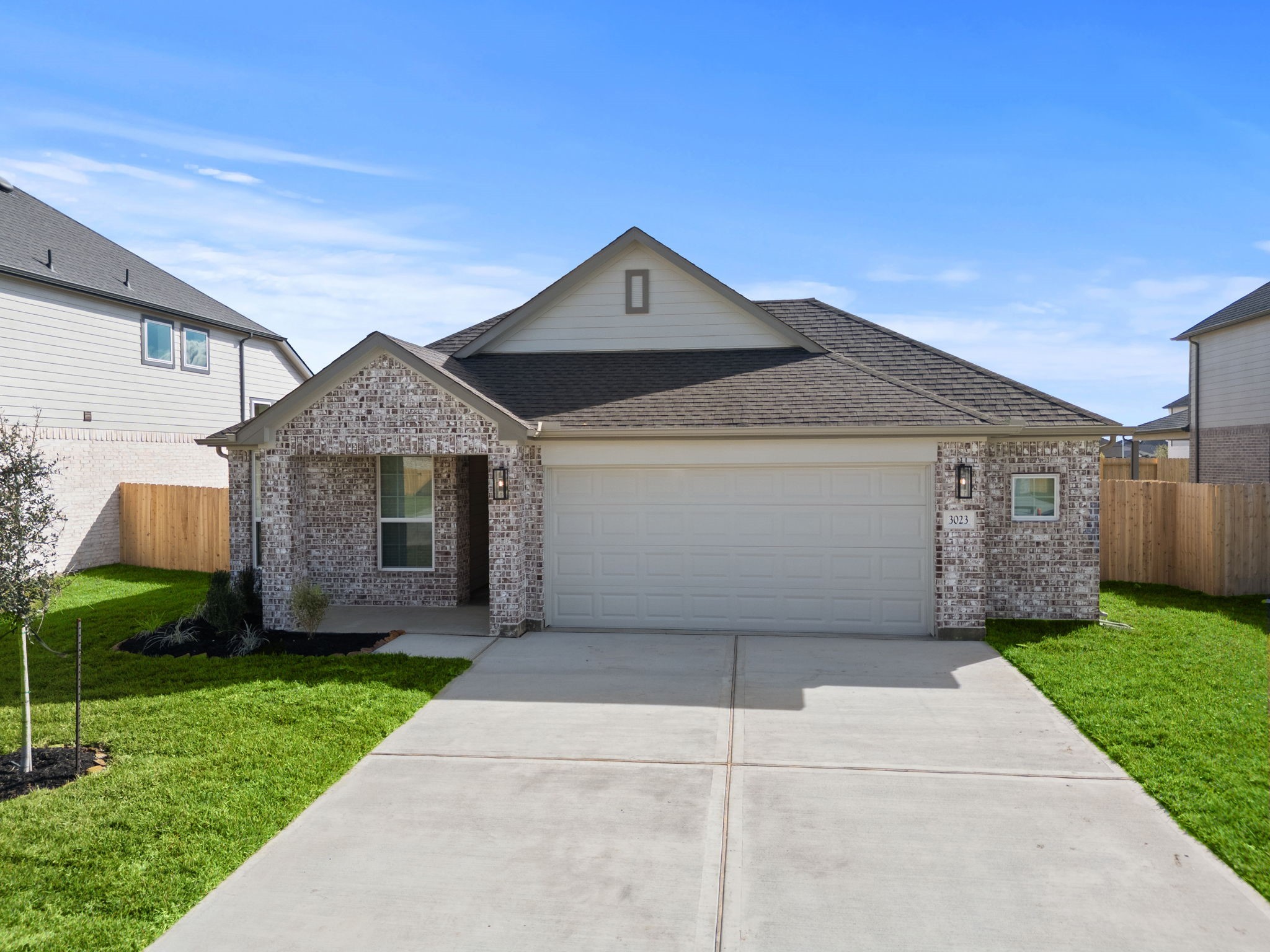 3023 Boulder Rdg Drive Rosenberg, TX 77471 - Photo 21 of 34 a front view of a house with a garden