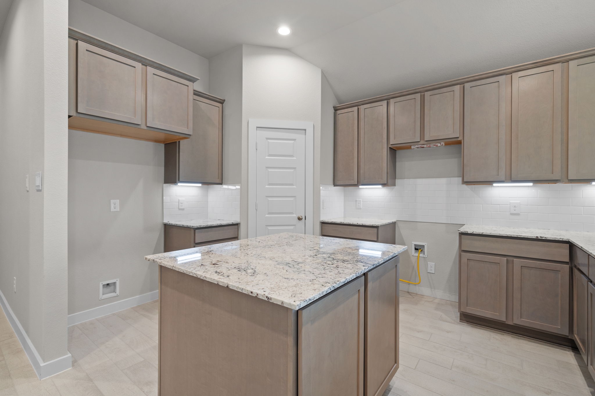 3023 Boulder Rdg Drive Rosenberg, TX 77471 - Photo 4 of 34 a kitchen with a sink and cabinets