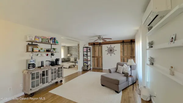 a view of a dining room with furniture