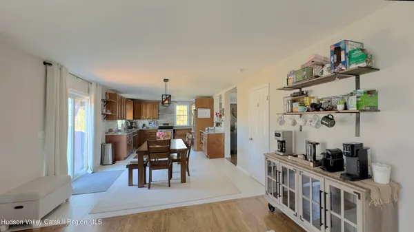 a bedroom with furniture and a chandelier