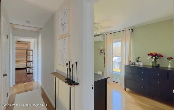 a bedroom with a bed and a walk in closet