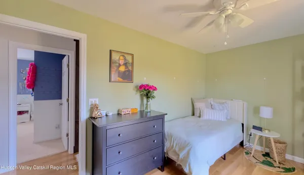 a bathroom with a sink mirror bathtub and toilet
